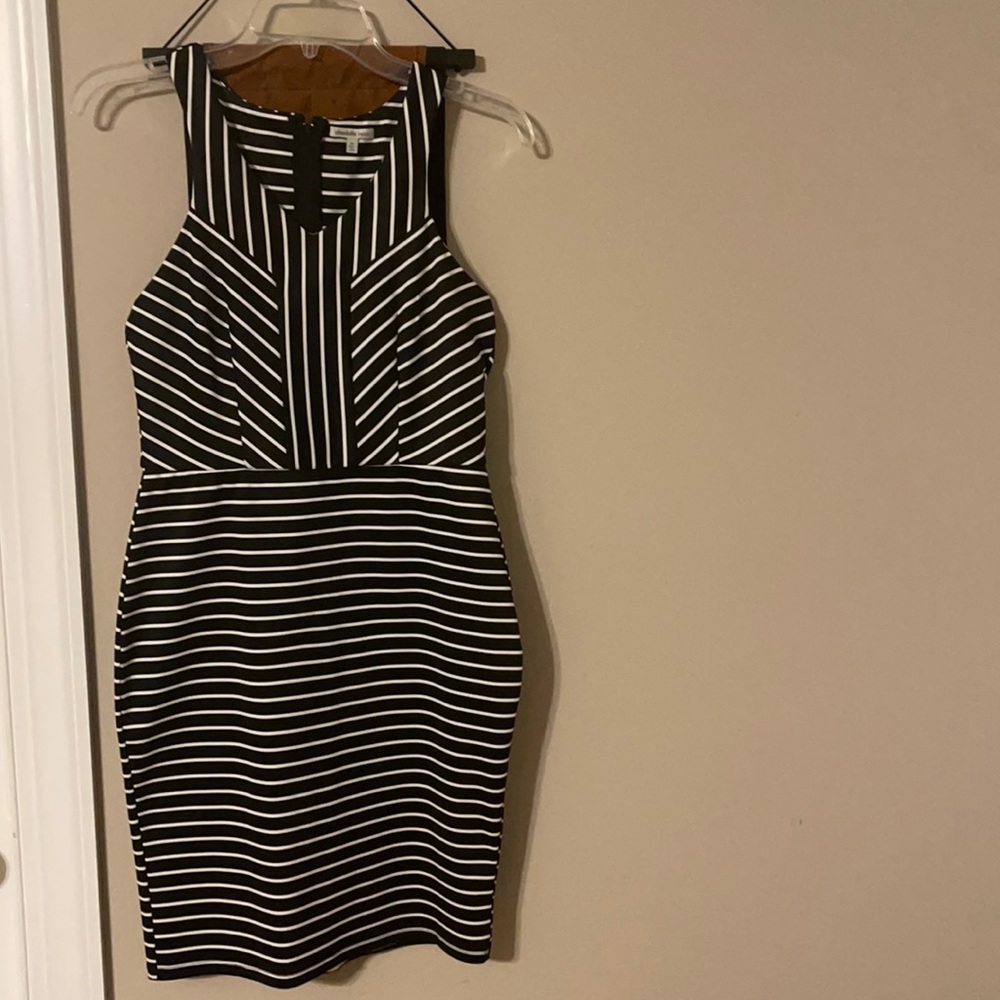 Beautiful black and white junior dress .